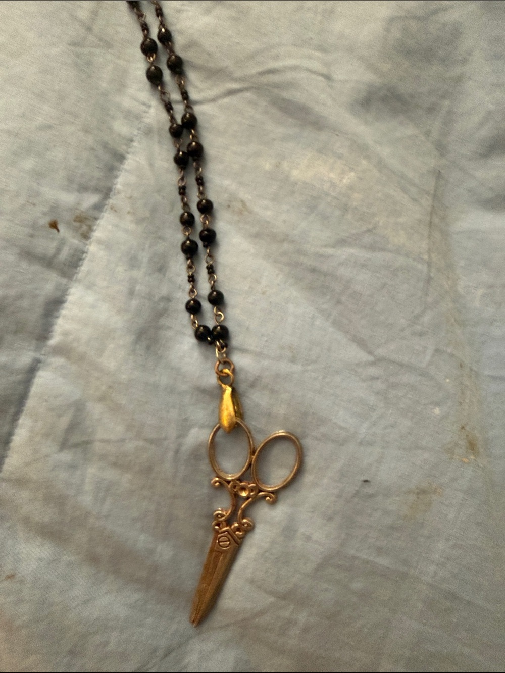 Gold Scissors Pendant on Black Beaded Chain